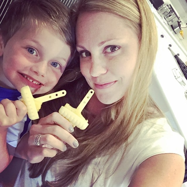 Sharing_a_popsicle_with_my_boy_to_beat_the_heat_today__These_are_mango_pineapple.___