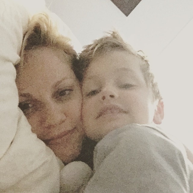 Favorite_way_to_be_woken_up._He_used_to_yell_from_his_room_it_s_7__But_now_he_comes_straight_in_and_snuggles.___mommymoments__80sbangs
