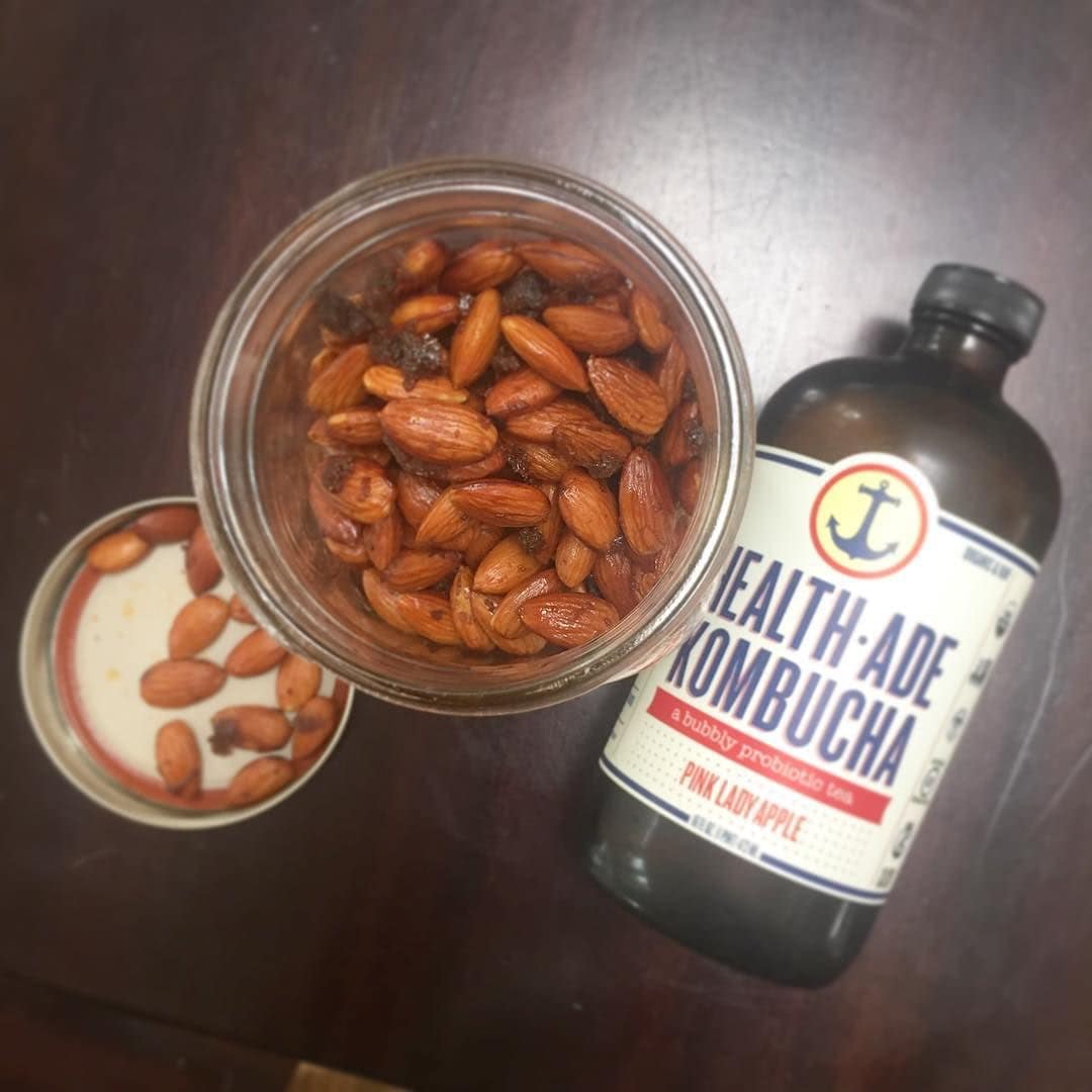 Snack_time__The_spicy_almonds_from_my_Thai_Salad_barely_make_it_onto_the_salad._They_re_my_favorite_thing_to_munch_on_these_days._And_I_m_currently_obsessed_with_this_flavor_of_Kombucha.