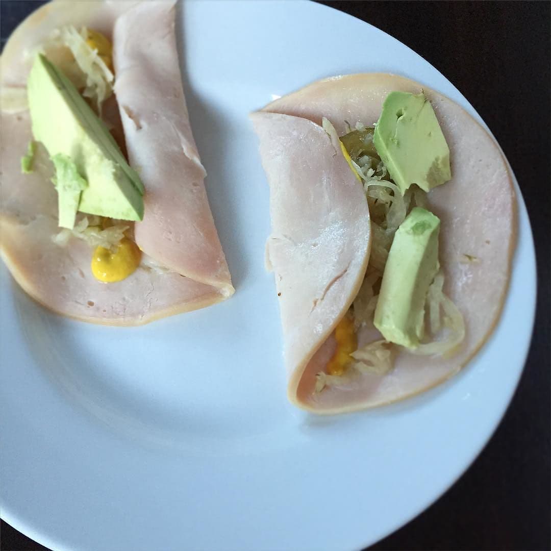 A_simple_snack._Turkey__nitratecarrageenan_free__roll_ups_with_avocado__mustard__and_garlic_dill_kraut._Tap_pic_for_brands.___aageats__paleo__glutenfree